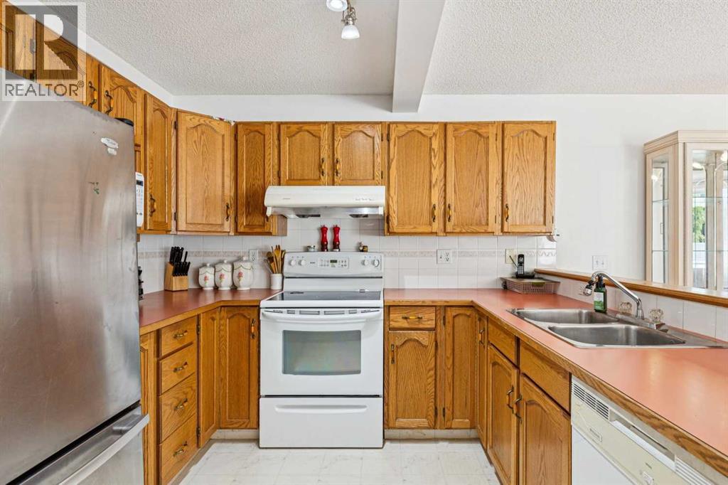 10521 Hidden Valley Drive NW, Calgary, Alberta  T3A 5W8 - Photo 12 - A2333979