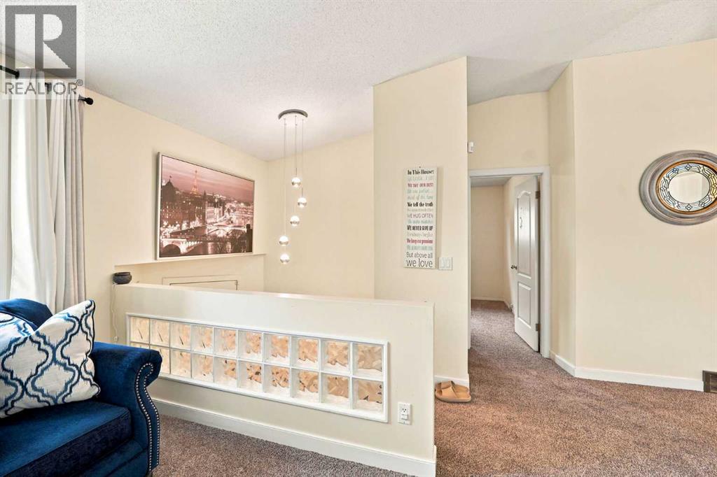 225 Harvest Glen Place NE, Calgary, Alberta  T3K 4J1 - Photo 15 - A2330527