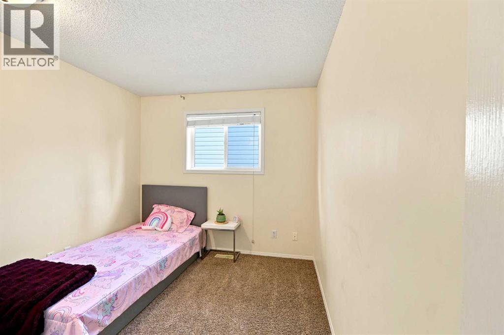 225 Harvest Glen Place NE, Calgary, Alberta  T3K 4J1 - Photo 18 - A2330527