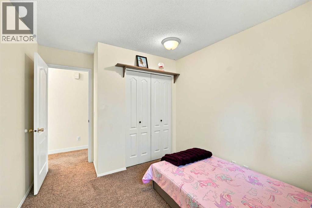 225 Harvest Glen Place NE, Calgary, Alberta  T3K 4J1 - Photo 19 - A2330527