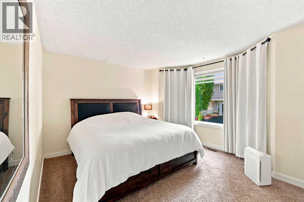 225 Harvest Glen Place NE, Calgary, Alberta  T3K 4J1 - Photo 22 - A2330527