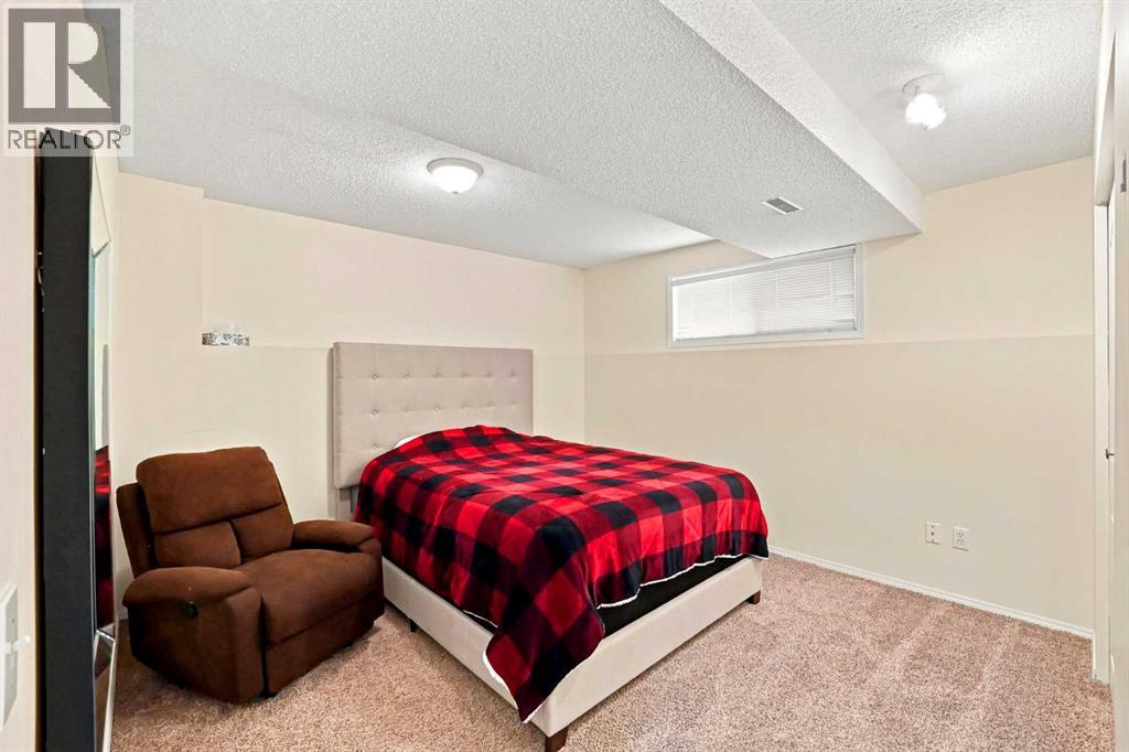 225 Harvest Glen Place NE, Calgary, Alberta  T3K 4J1 - Photo 28 - A2330527
