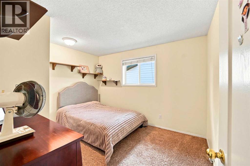 225 Harvest Glen Place NE, Calgary, Alberta  T3K 4J1 - Photo 16 - A2330527