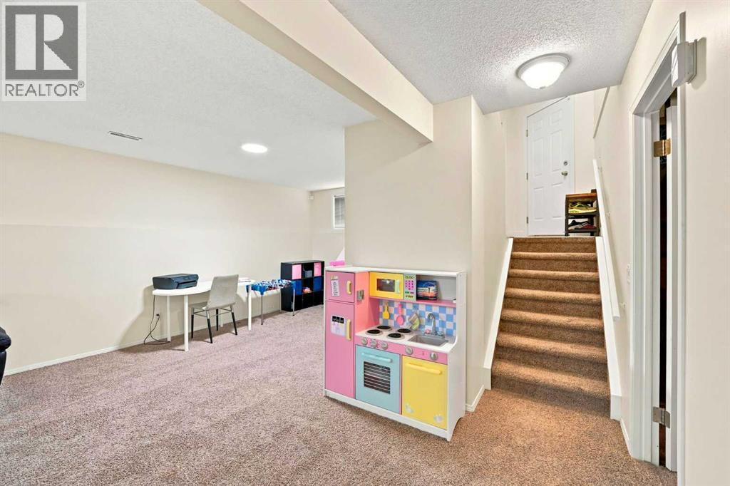 225 Harvest Glen Place NE, Calgary, Alberta  T3K 4J1 - Photo 25 - A2330527