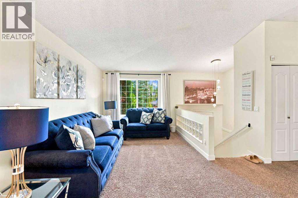 225 Harvest Glen Place NE, Calgary, Alberta  T3K 4J1 - Photo 10 - A2330527