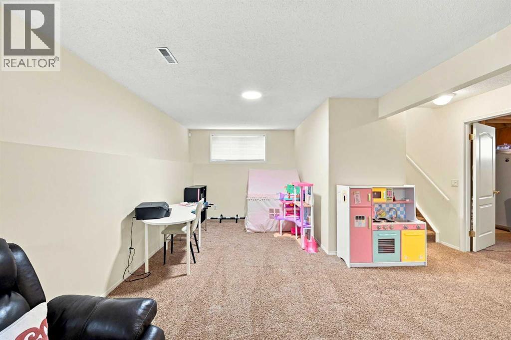 225 Harvest Glen Place NE, Calgary, Alberta  T3K 4J1 - Photo 24 - A2330527