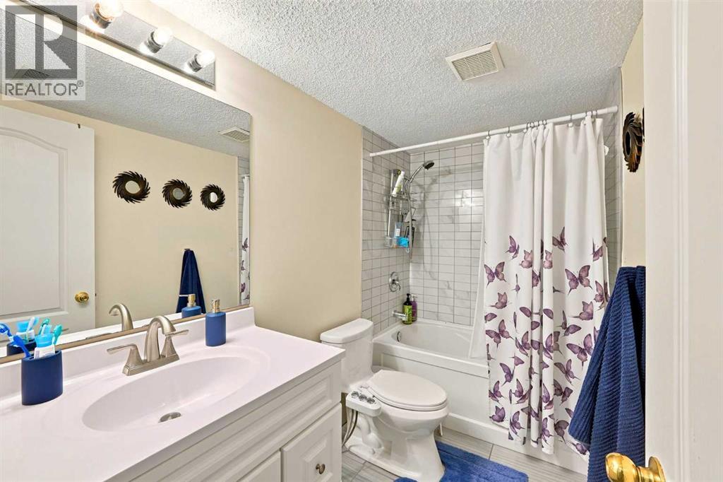 225 Harvest Glen Place NE, Calgary, Alberta  T3K 4J1 - Photo 30 - A2330527