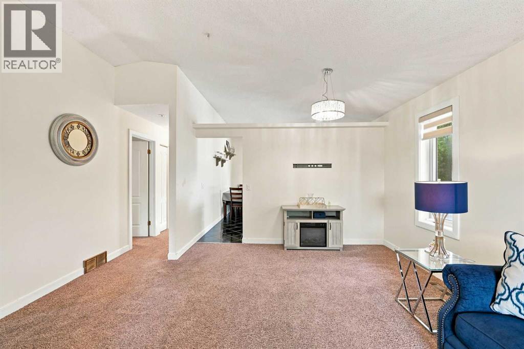 225 Harvest Glen Place NE, Calgary, Alberta  T3K 4J1 - Photo 13 - A2330527