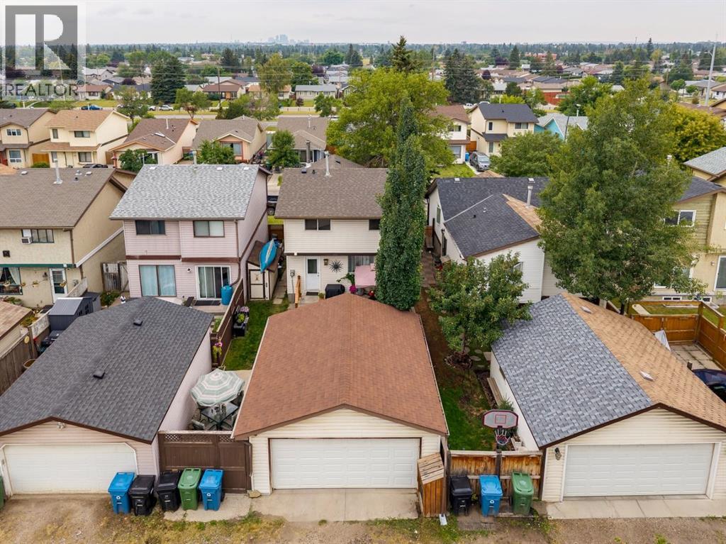 283 Abinger Crescent Ne, Calgary, Alberta  T2A 6L2 - Photo 3 - A2336342