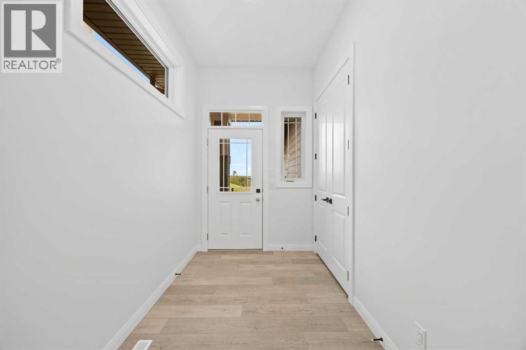 101 Creekstone Hill SW, Calgary, Alberta  T3P 2V3 - Photo 3 - A2311636