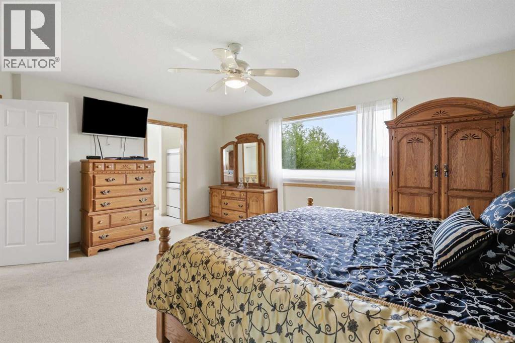 535 Cimarron Point, Okotoks, Alberta  T1S 1S6 - Photo 20 - A2337340