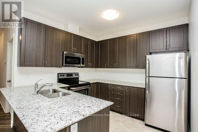 309 - 33 Whitmer Street, Milton, Ontario  L9T 8P9 - Photo 9 - W13682820