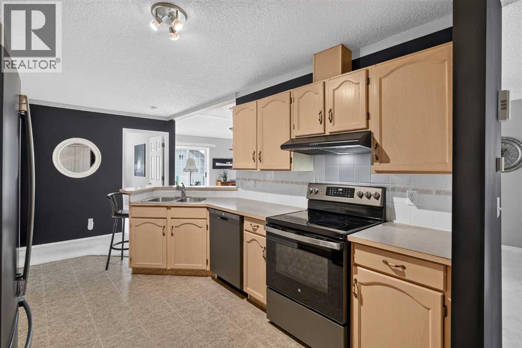 204, 39 Hidden Creek Place NW, Calgary, Alberta T3A 6B9 - Photo 19 - A2334820