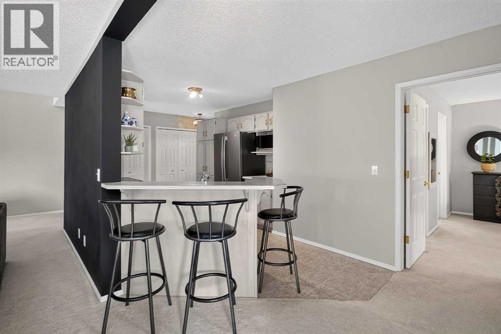204, 39 Hidden Creek Place NW, Calgary, Alberta T3A 6B9 - Photo 16 - A2334820