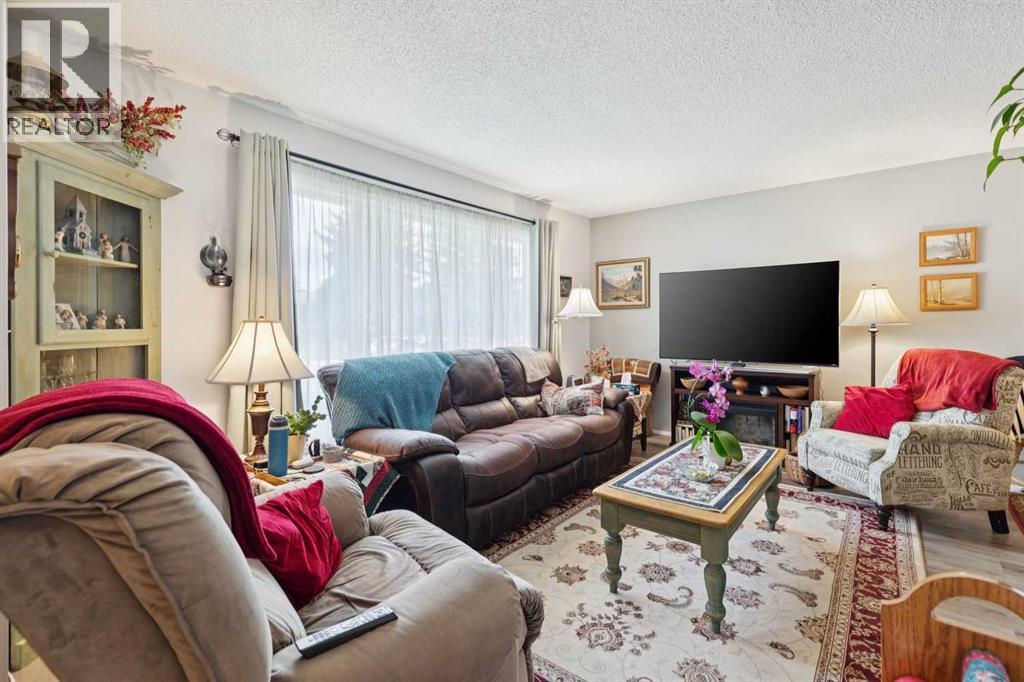 102 Thorson Crescent, Okotoks, Alberta  T1S 1C8 - Photo 3 - A2329194