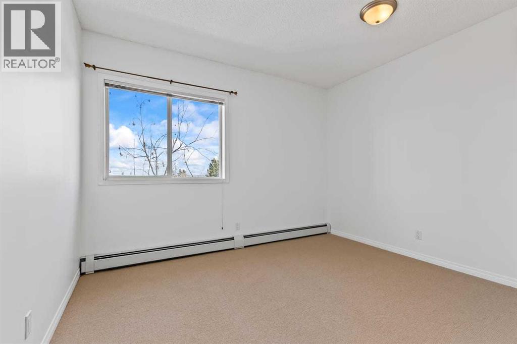 304, 2022 Canyon Meadows Drive SE, Calgary, Alberta  T2J 7H1 - Photo 24 - A2293821