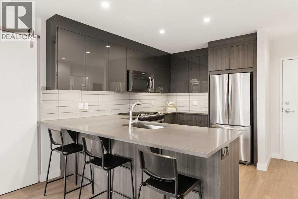203, 1526 9 Avenue Se, Calgary, Alberta T2G 0T7 - Photo 9 - A2333593