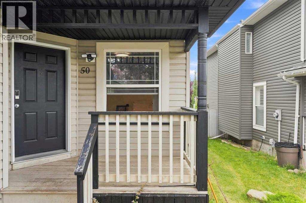 50 Somerglen Park SW, Calgary, Alberta  T2Y 3M5 - Photo 3 - A2336677
