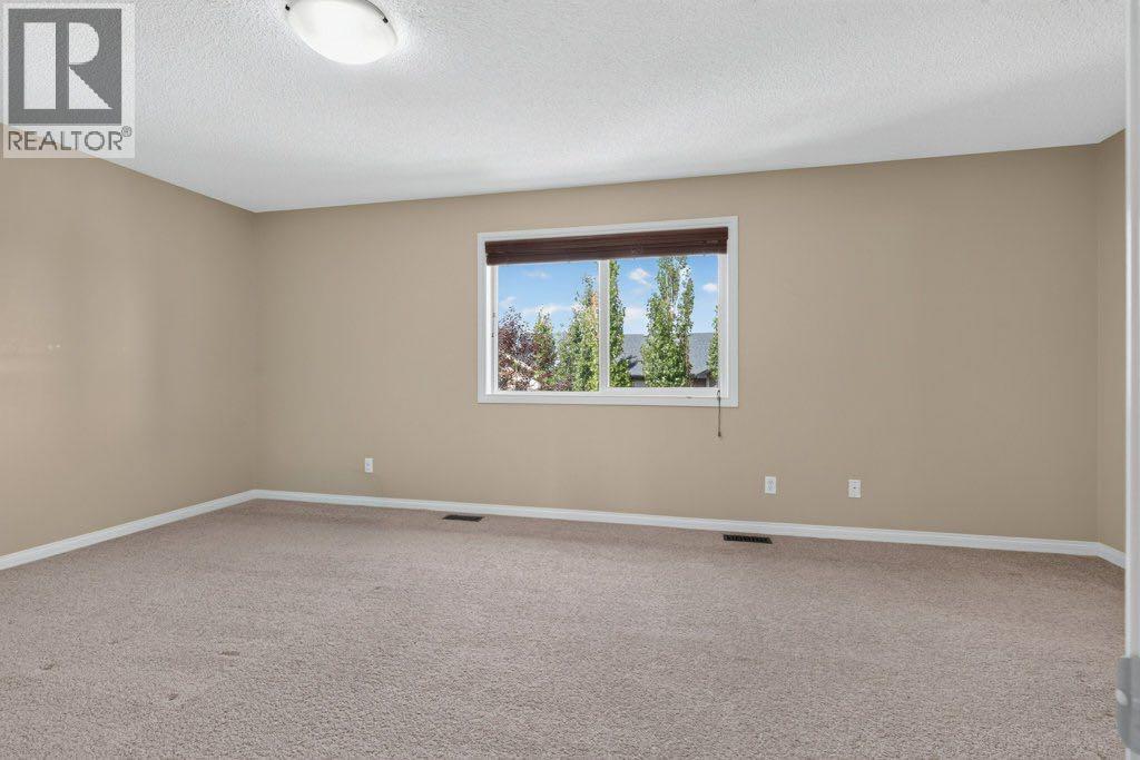 164 Aspenmere Close, Chestermere, Alberta  T1X 0G3 - Photo 16 - A2337731