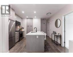 206 707 COMO LAKE AVENUE, Coquitlam, British Columbia
