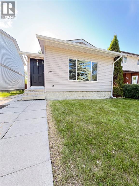 6879 Rundlehorn Drive Ne, Calgary, Alberta  T1Y 4P2 - Photo 3 - A2328399