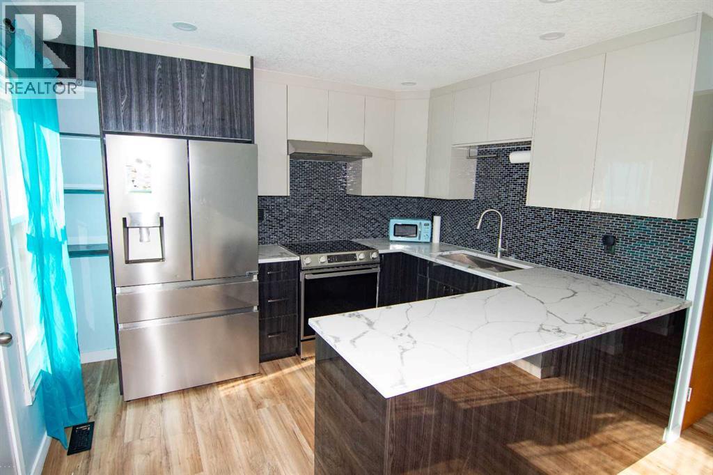 6, 100 Pennsylvania Road SE, Calgary, Alberta T2A 4Y8 - Photo 1 - A2303295