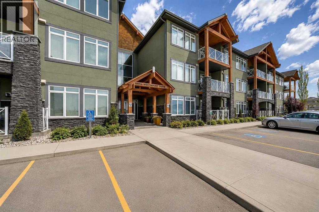 110, 1005a Westmount Drive, Strathmore, Alberta  T1P 0C3 - Photo 1 - A2320502