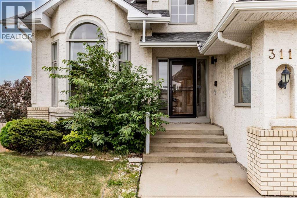 311 Hawkland Place NW, Calgary, Alberta  T3G 3R4 - Photo 2 - A2335805