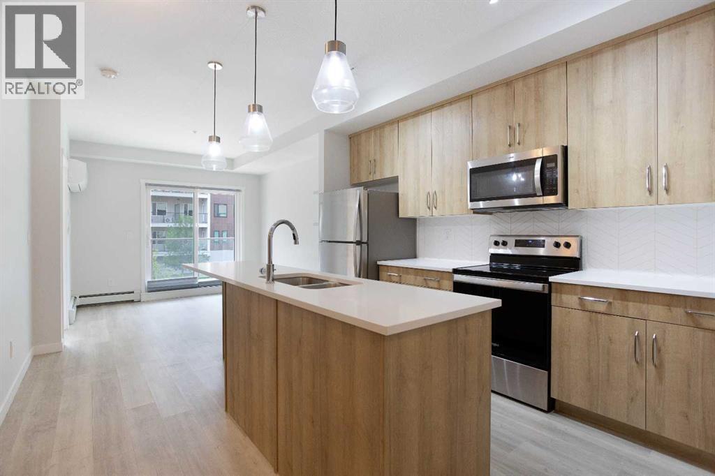 206, 71 Shawnee Common SW, Calgary, Alberta  T2Y 0R2 - Photo 3 - A2336282