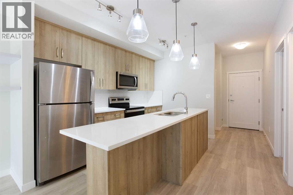 206, 71 Shawnee Common SW, Calgary, Alberta  T2Y 0R2 - Photo 4 - A2336282