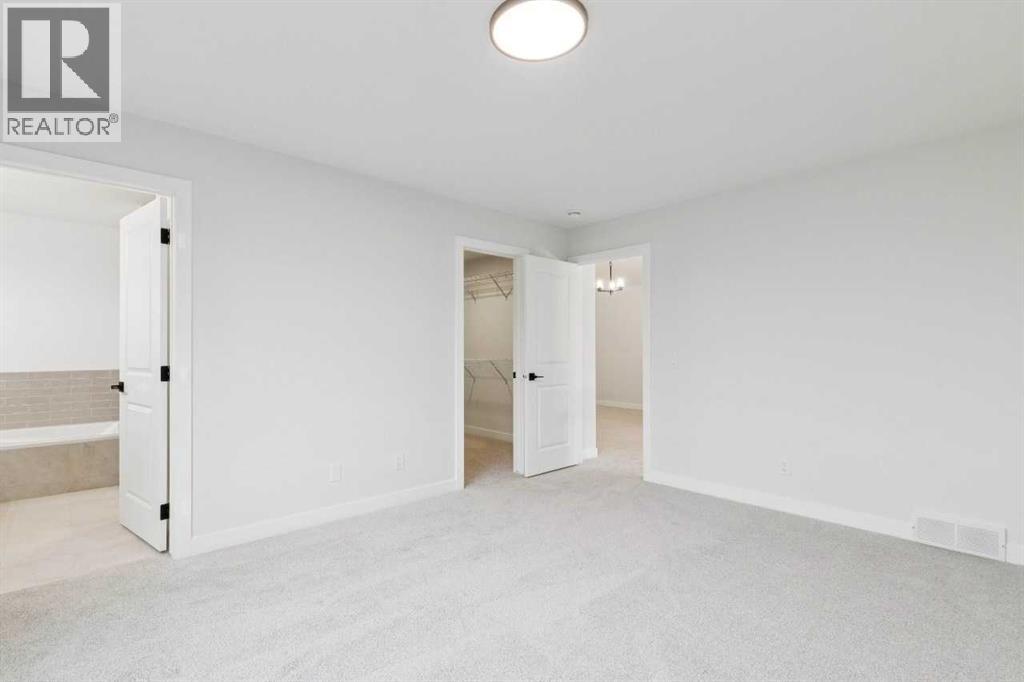 145 Snowberry Common SE, Calgary, Alberta  T3M 4G6 - Photo 38 - A2324737