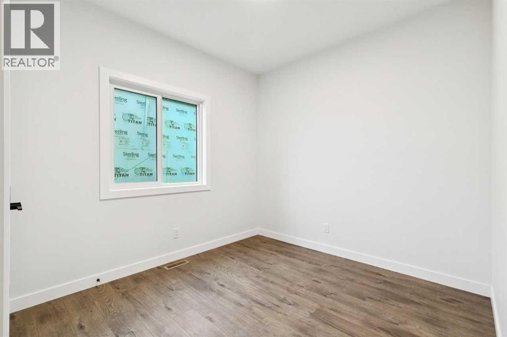145 Snowberry Common SE, Calgary, Alberta  T3M 4G6 - Photo 5 - A2324737