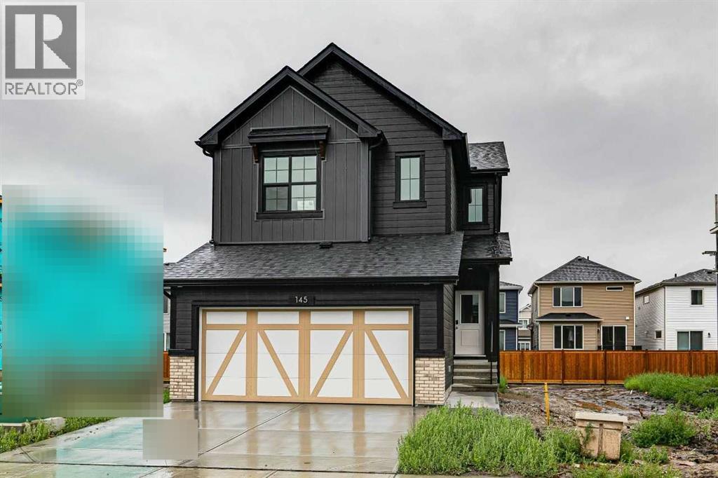 145 Snowberry Common SE, Calgary, Alberta  T3M 4G6 - Photo 3 - A2324737
