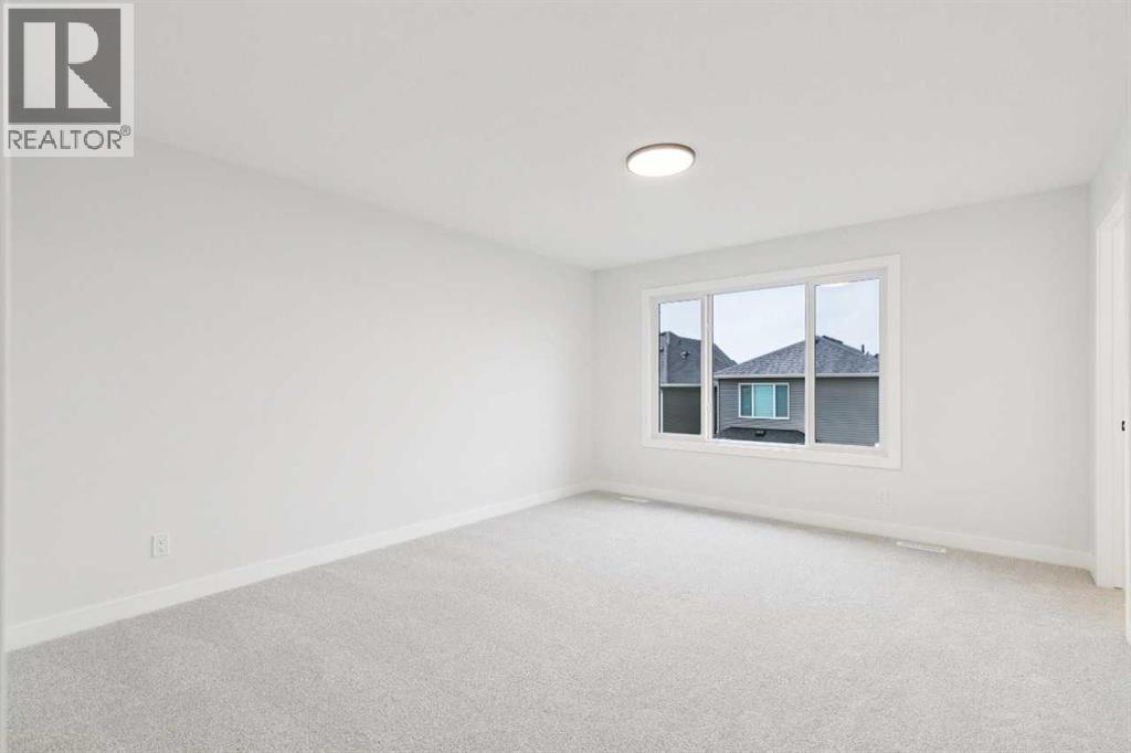 145 Snowberry Common SE, Calgary, Alberta  T3M 4G6 - Photo 35 - A2324737