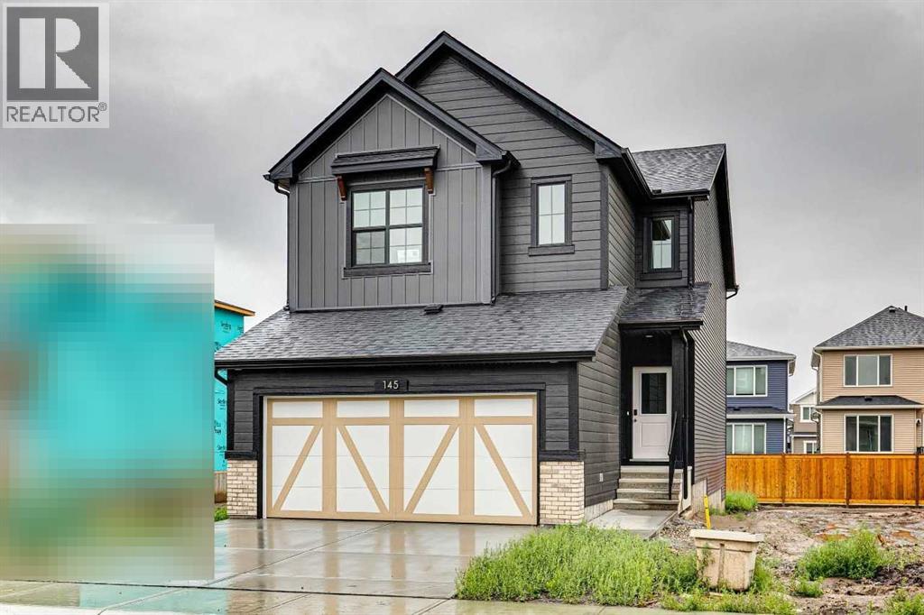 145 Snowberry Common SE, Calgary, Alberta  T3M 4G6 - Photo 1 - A2324737