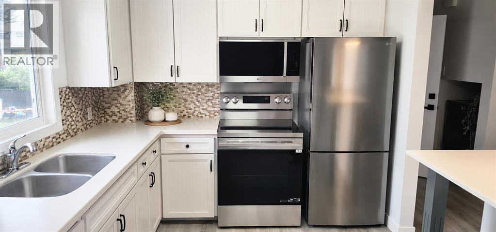 5407 Dalrymple Crescent NW, Calgary, Alberta  T3A 1R2 - Photo 2 - A2314249