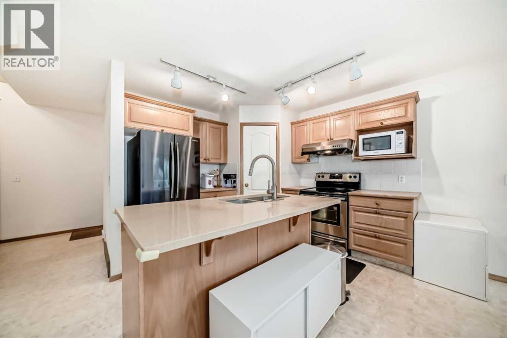 83 Hawkmount Green NW, Calgary, Alberta  T3G 3T9 - Photo 5 - A2307994
