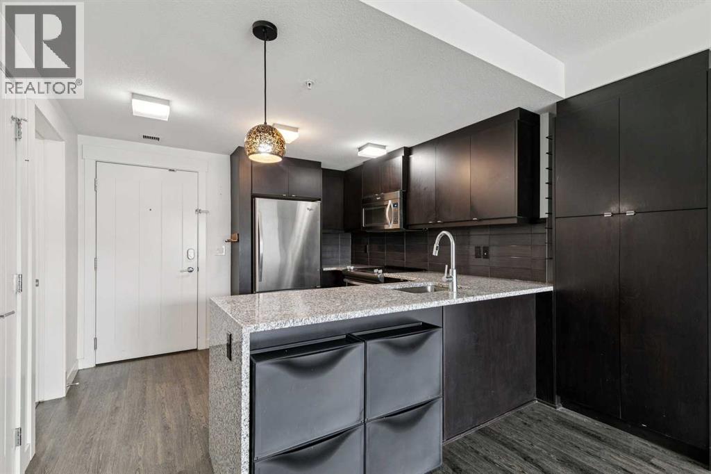 225, 15 Aspenmont Heights Sw, Calgary, Alberta T3H 0E3 - Photo 9 - A2336179
