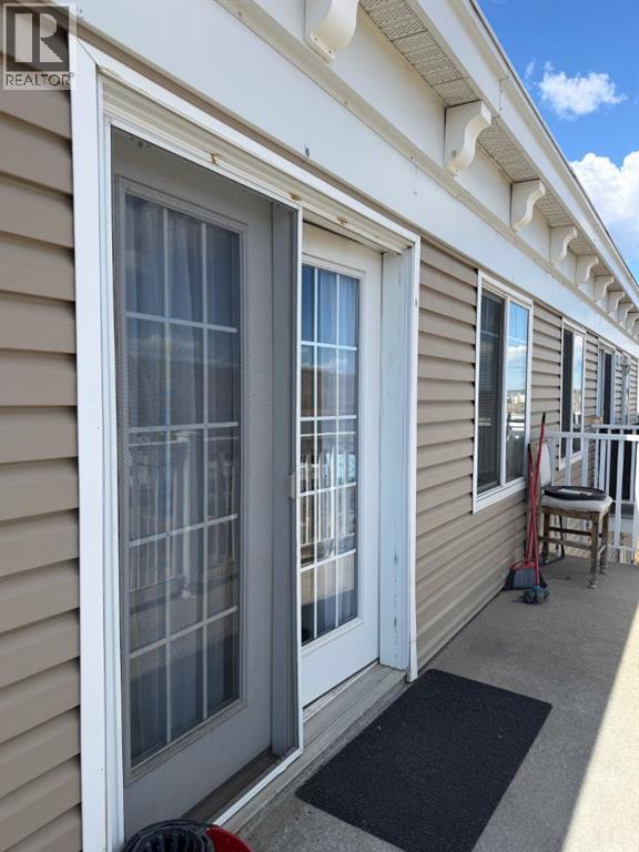 404, 10217 Queen Street, Fort Mcmurray, Alberta T9H 5S5 - Photo 2 - A2309829
