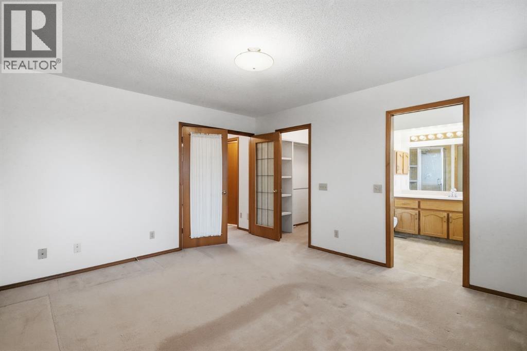 61 Shannon Crescent SW, Calgary, Alberta  T2Y 2T8 - Photo 22 - A2330678