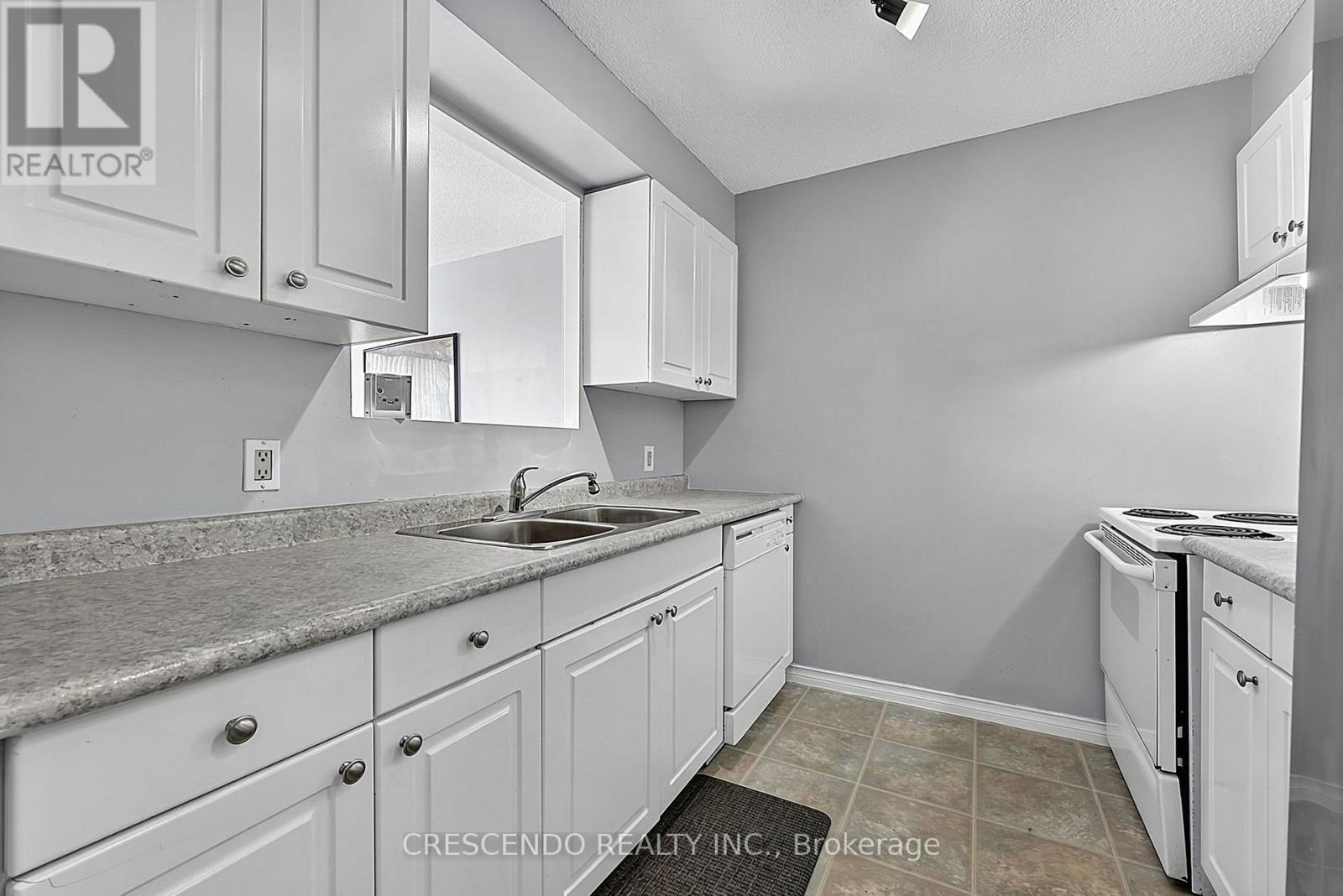 201 - 100 Millside Drive, Milton, Ontario  L9T 5E2 - Photo 6 - W13684990