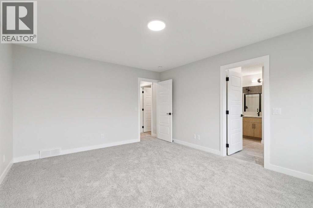 97 Creekstone Hill SW, Calgary, Alberta  T2X 5G3 - Photo 28 - A2306344