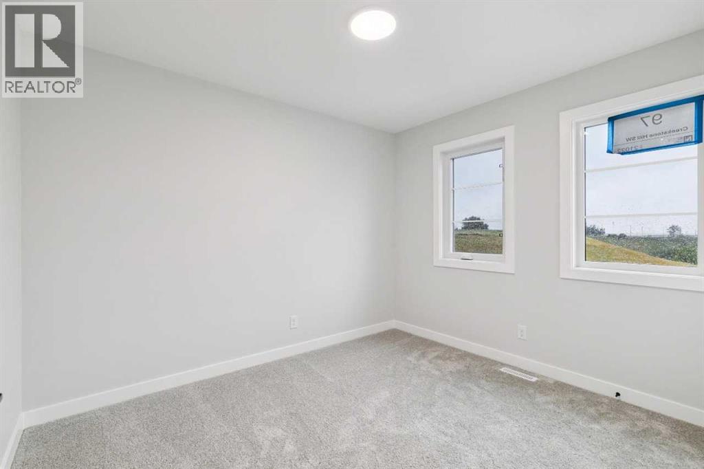 97 Creekstone Hill SW, Calgary, Alberta  T2X 5G3 - Photo 23 - A2306344