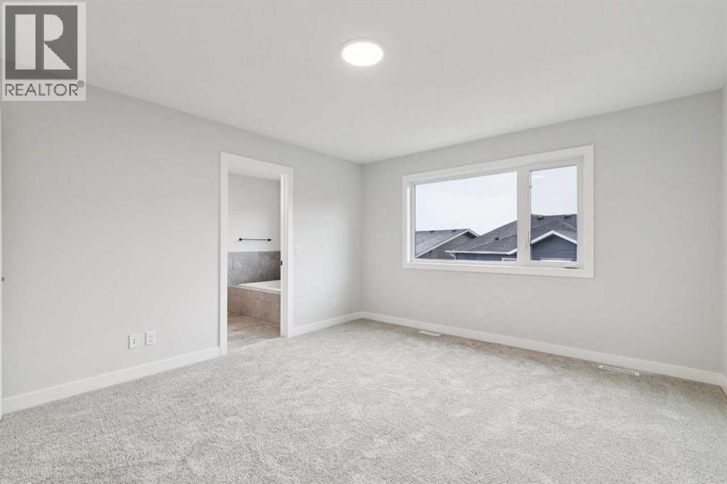 97 Creekstone Hill SW, Calgary, Alberta  T2X 5G3 - Photo 27 - A2306344