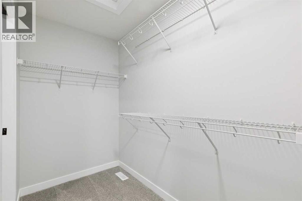 97 Creekstone Hill SW, Calgary, Alberta  T2X 5G3 - Photo 33 - A2306344