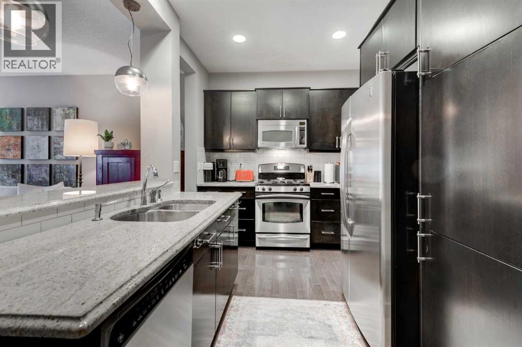 78 Ypres Green SW, Calgary, Alberta  T2T 6M1 - Photo 7 - A2316254