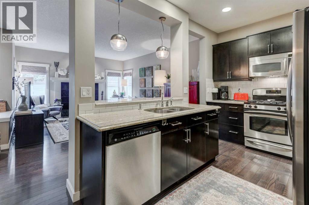 78 Ypres Green SW, Calgary, Alberta  T2T 6M1 - Photo 6 - A2316254