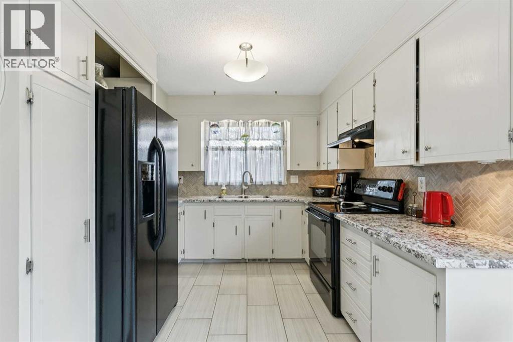 323 Ranchview Place NW, Calgary, Alberta  T3G 1J8 - Photo 7 - A2335640