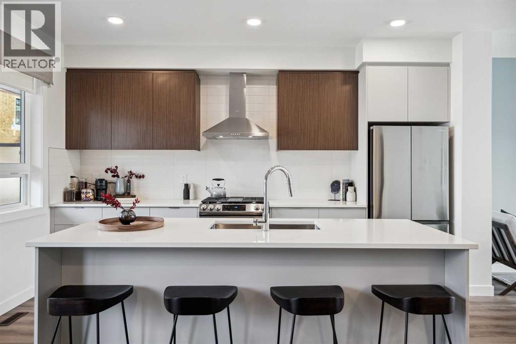 132 Quesnay Wood Link SW, Calgary, Alberta  T3E 8H6 - Photo 8 - A2319355
