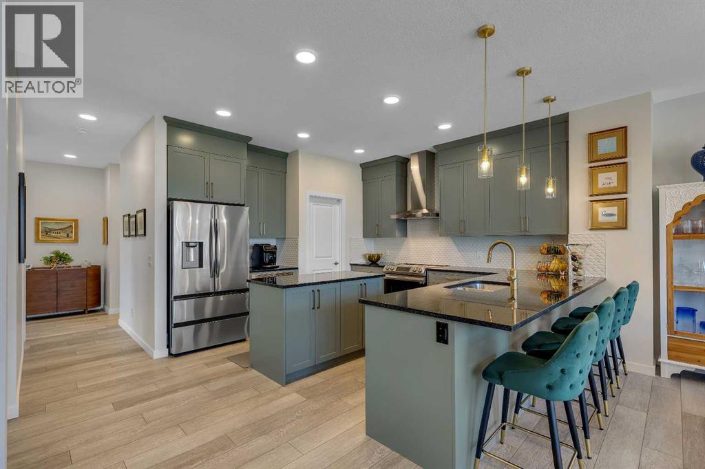 168 Magnolia Manor Se, Calgary, Alberta  T3M 3J1 - Photo 6 - A2329186